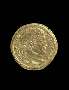 Solidus (obverse) of Constantine I the Great with a bare bust and wearing a laurel wreath. Inscription: CONSTANTINVS P F AVG